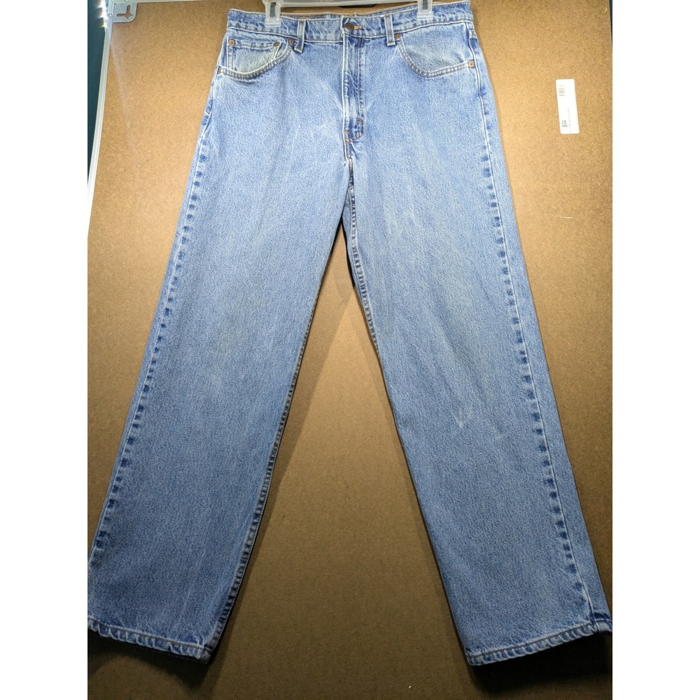 Vintage Levis 550 Relaxed Fit Jeans Mens 36x30 Light Wash Blue Denim Made in USA